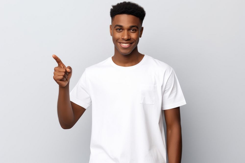 Index finger on your white t-shirt standing pointing portrait. AI generated Image by rawpixel.