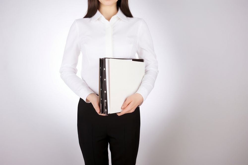 Woman holding files sleeve white white background. AI generated Image by rawpixel.