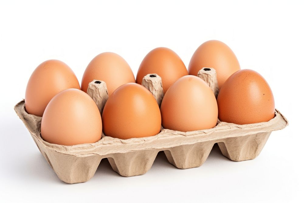 Fresh brown chicken eggs in an egg box food white background simplicity. AI generated Image by rawpixel.