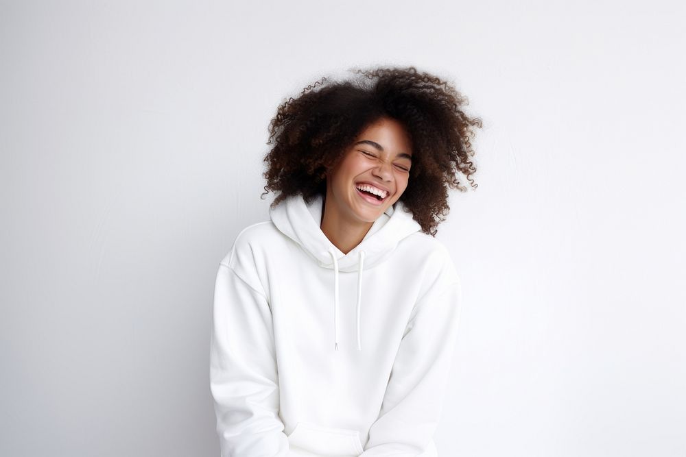 Woman in white sweaater laughing sweatshirt sweater. AI generated Image by rawpixel.