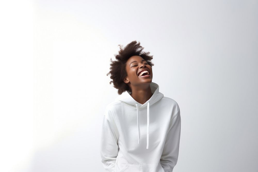 Woman in white sweaater sweatshirt laughing white background. AI generated Image by rawpixel.