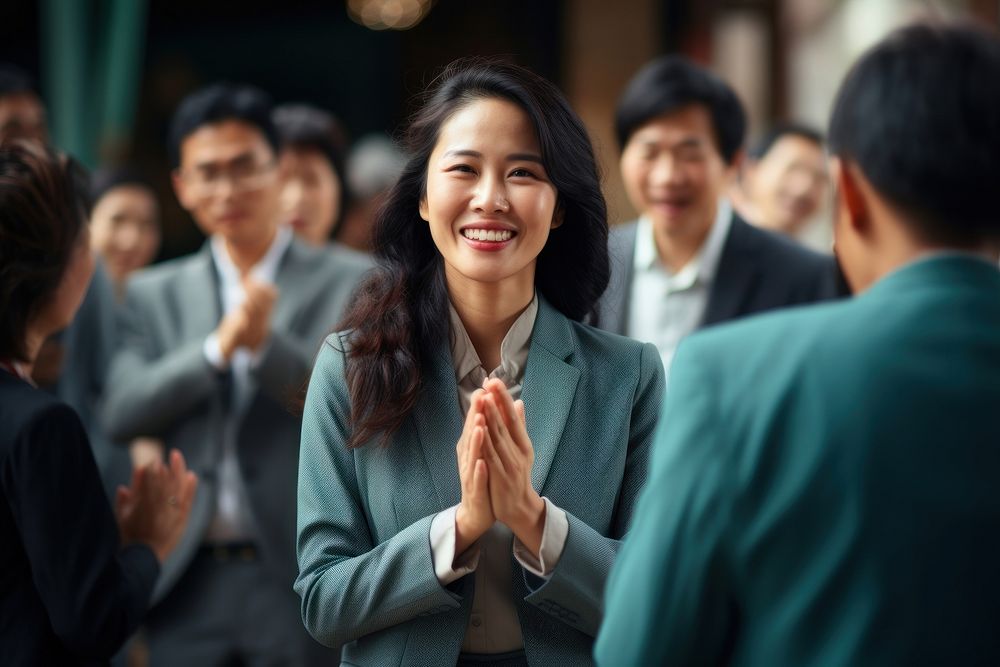 Middleage laotian businesswoman adult togetherness spirituality. AI generated Image by rawpixel.