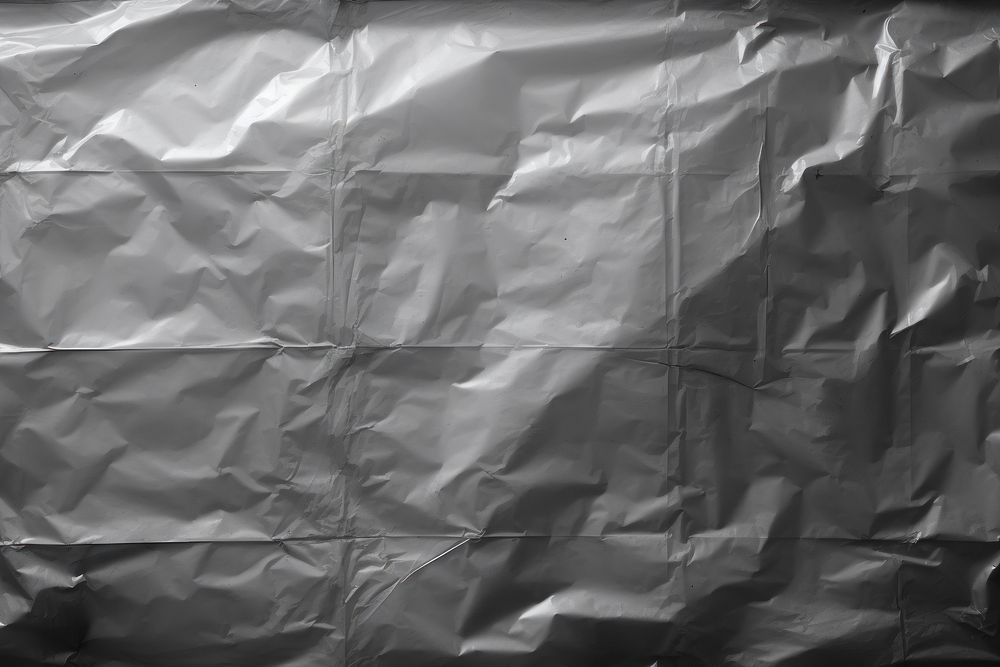 Plastic wrap backgrounds monochrome wrinkled. AI generated Image by rawpixel.