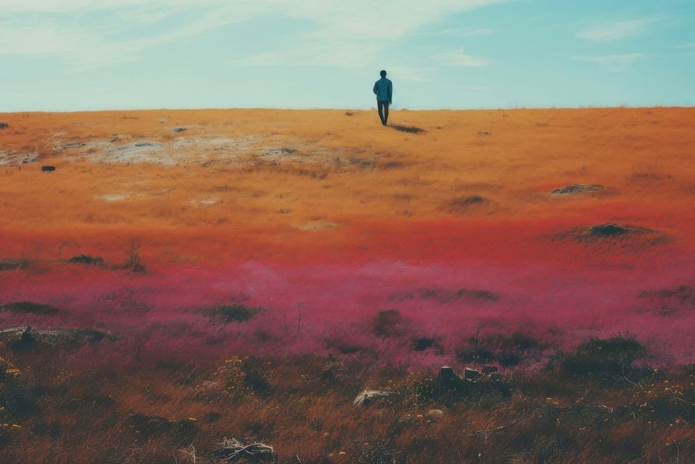 An african man landscape grassland standing. AI generated Image by rawpixel.