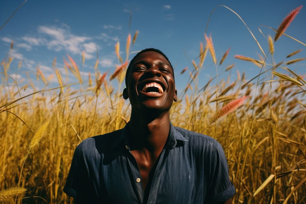 An happy affrican man portrait photography landscape grass. AI generated Image by rawpixel.