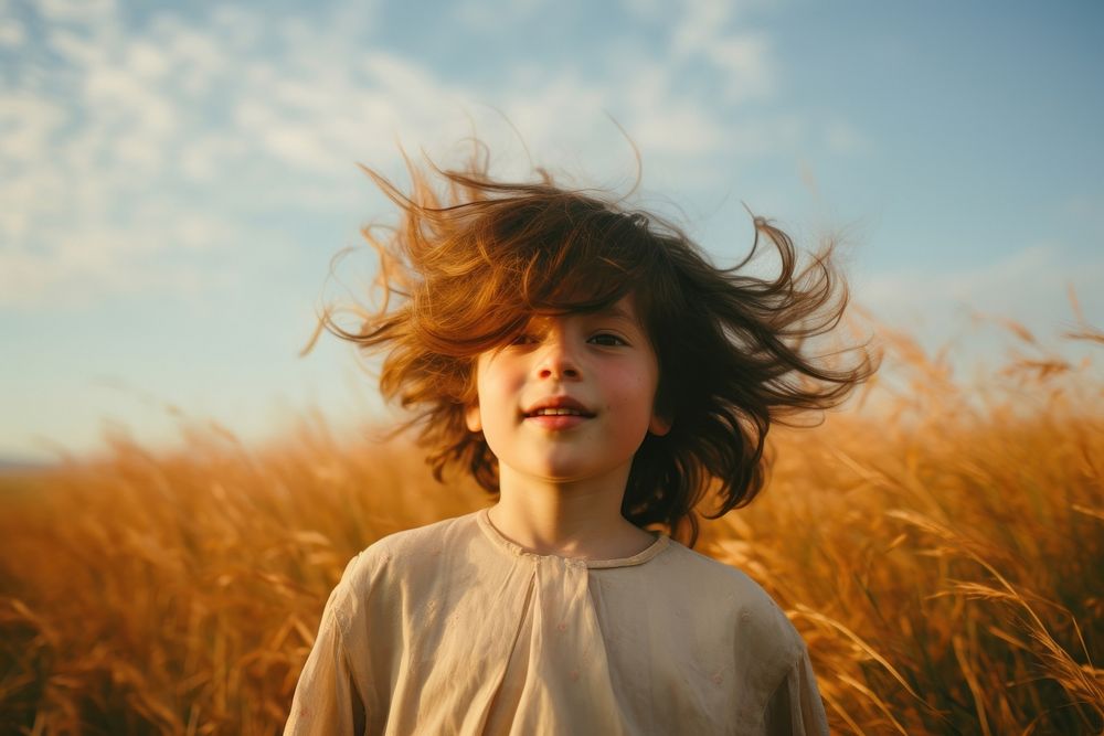 An happy child portrait grass photography landscape. AI generated Image by rawpixel.