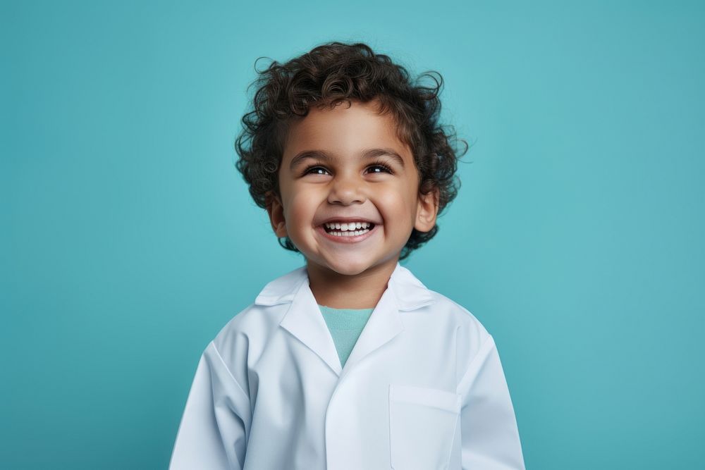 Lab gown smiling child smile. AI generated Image by rawpixel.