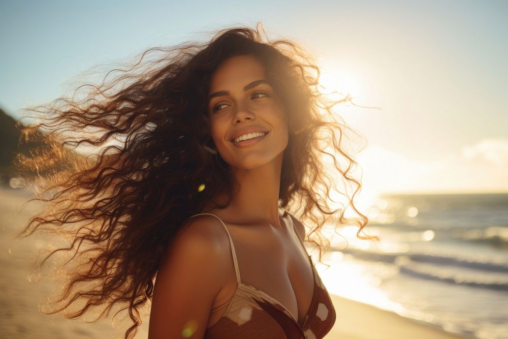 A Latina Brazilian woman standing with her hair gathered by the seaside swimwear portrait outdoors. AI generated Image by…