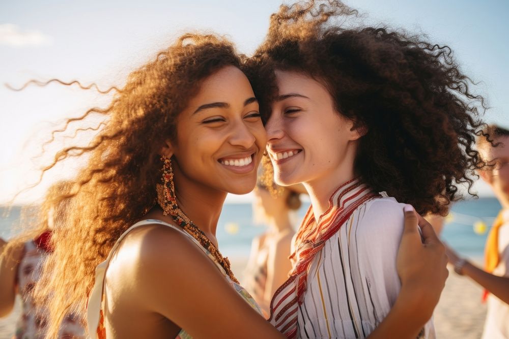 Two Latina Brazilian friends embracing laughing summer. AI generated Image by rawpixel.
