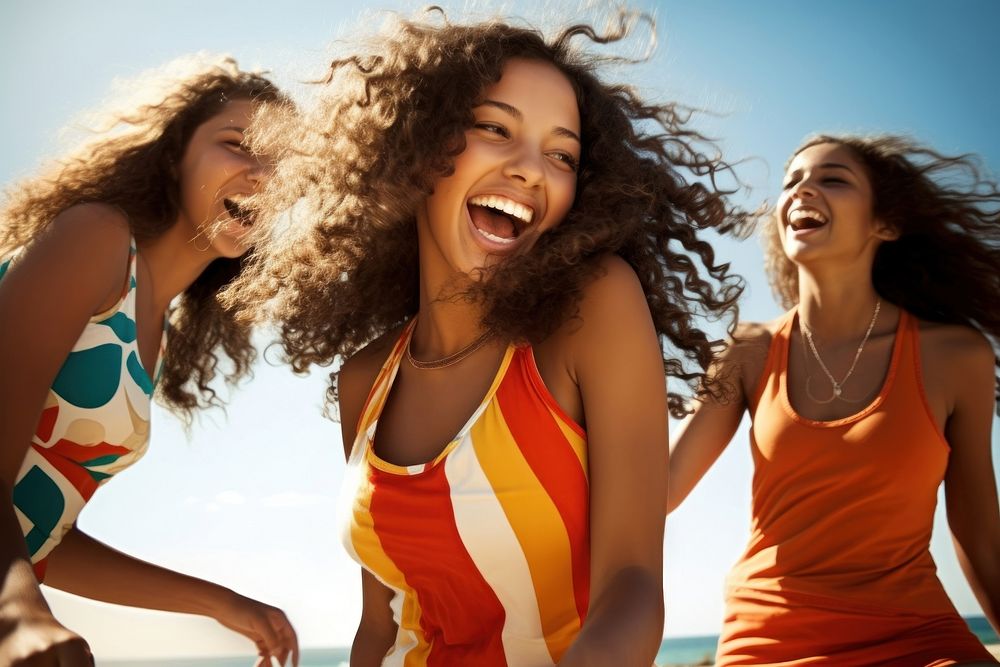 Three Latina Brazilian teenage girls in a medium-full shot playing a beach volleyball game happiness laughing summer. AI…