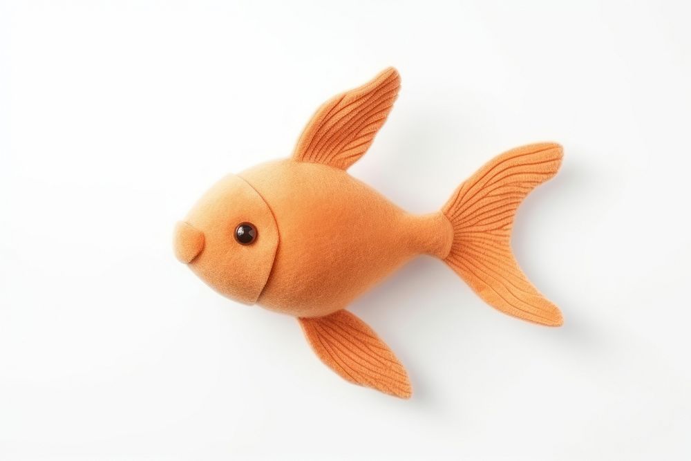 A goldfish animal toy white background. AI generated Image by rawpixel.