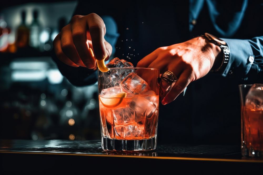 A bartender making a cocktail drink hand refreshment. AI generated Image by rawpixel.