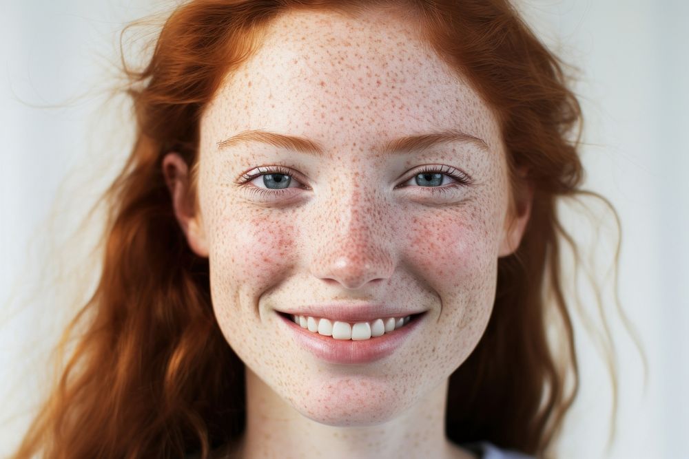 A happy woman with freckles on her face adult skin hairstyle. AI generated Image by rawpixel.