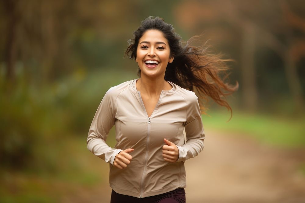 Indian woman running laughing smiling. AI generated Image by rawpixel.