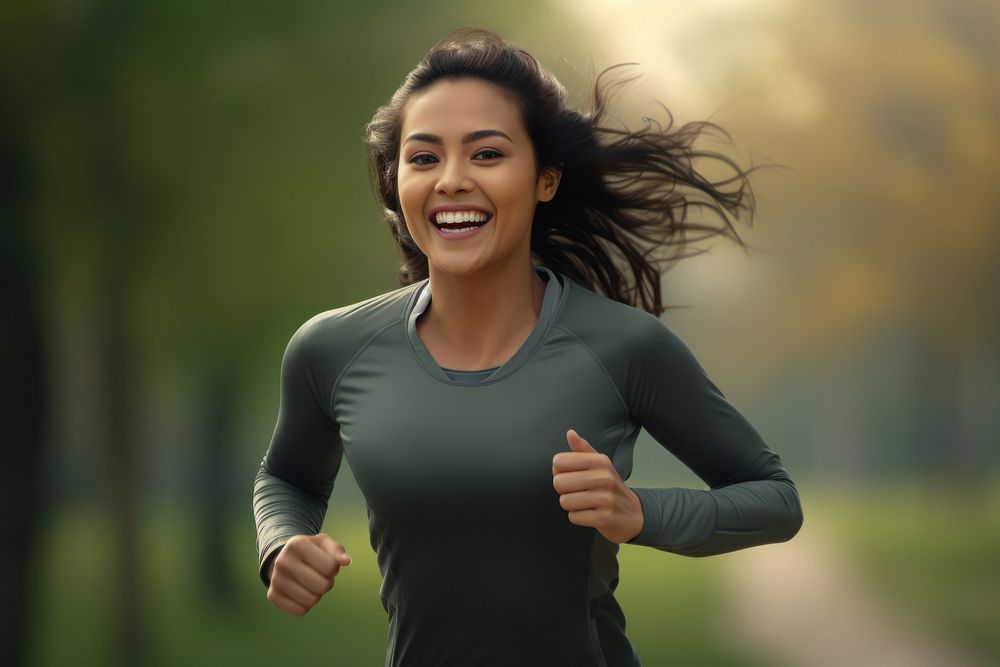 Indian woman running smiling jogging. AI generated Image by rawpixel.