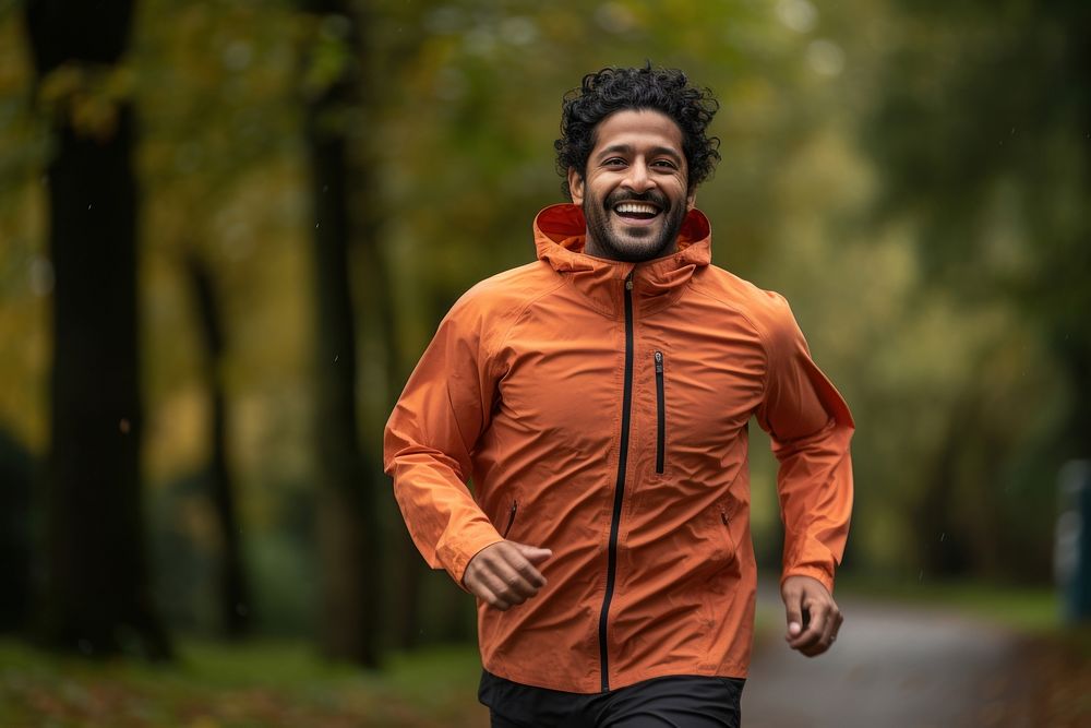 Indian man running jogging smiling. AI generated Image by rawpixel.