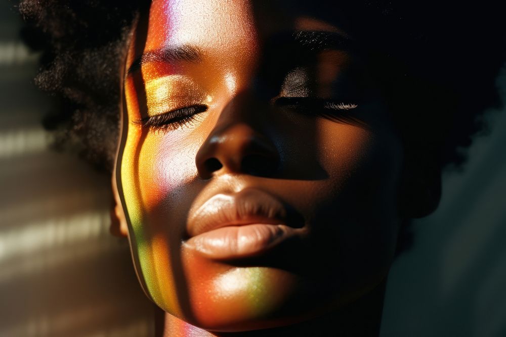 Rainbow light on black woman face photography portrait adult. AI generated Image by rawpixel.