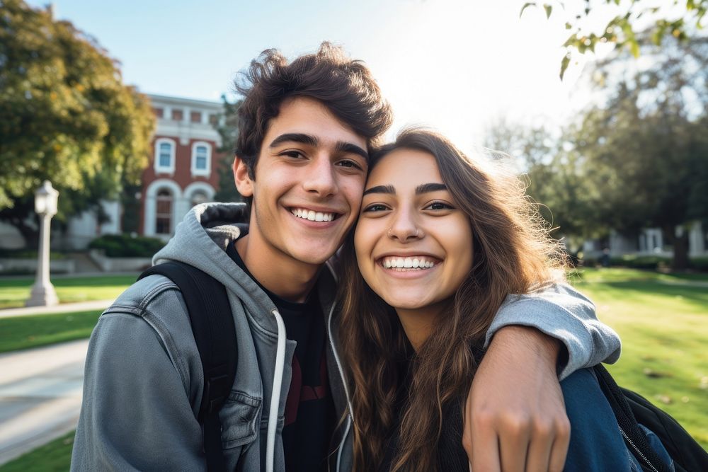 Teen hispanic couple smiling together selfie laughing outdoors. AI generated Image by rawpixel.