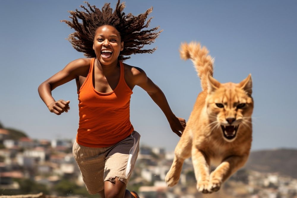 Orange cat a Black South African woman pet running. AI generated Image by rawpixel.