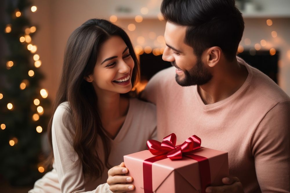 Hispanic husband surprising his wife adult gift box. AI generated Image by rawpixel.