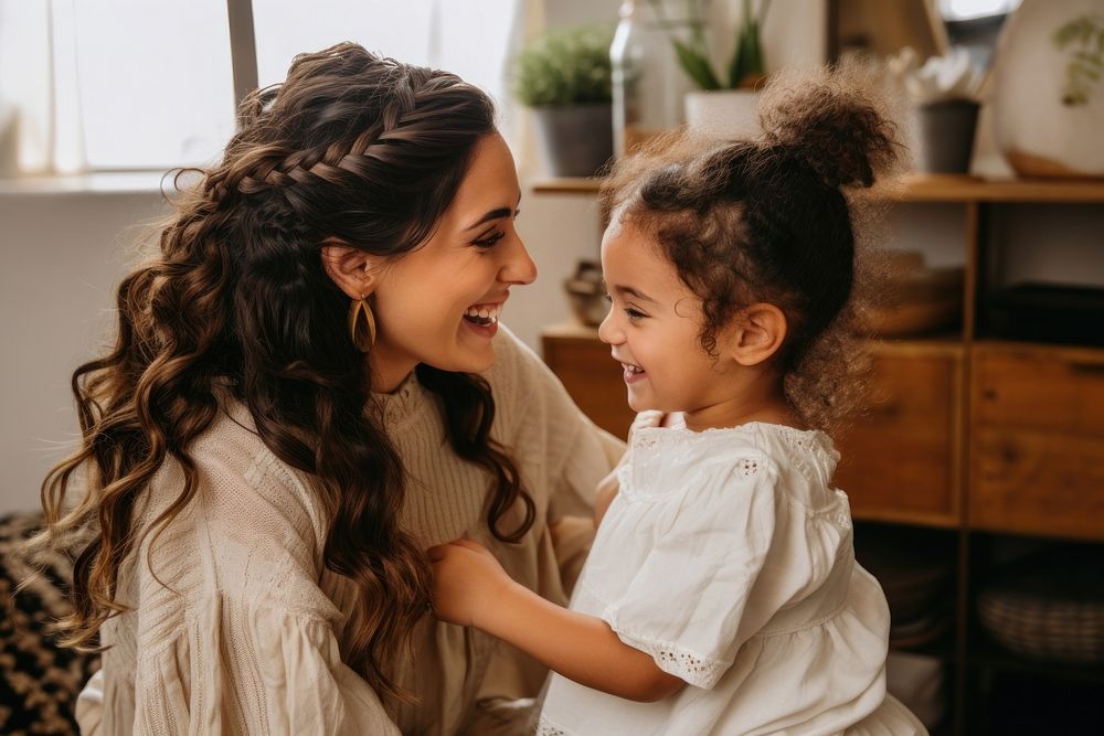 Hispanic mother doing a braid to a child daughter people togetherness affectionate. AI generated Image by rawpixel.