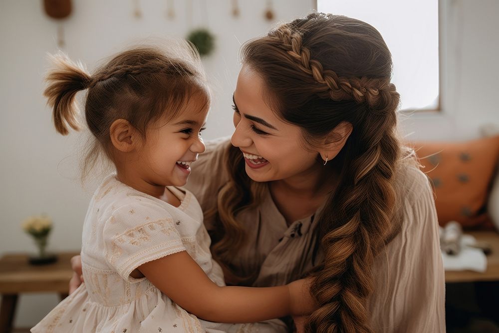 Hispanic mother doing a braid to a child daughter people affectionate togetherness. AI generated Image by rawpixel.