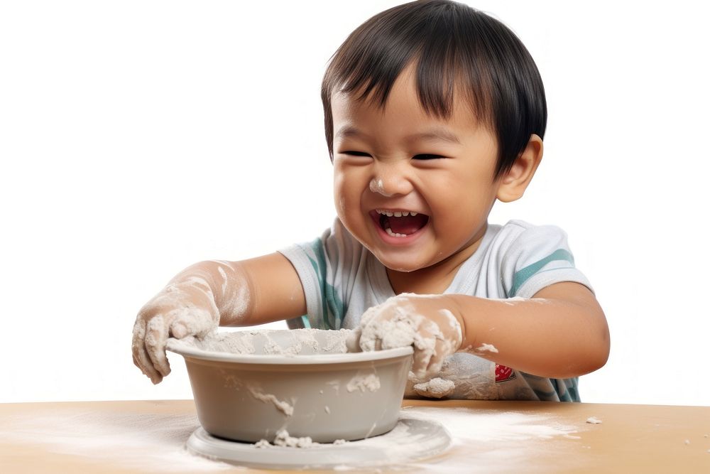 Happy asian kid baby bowl innocence. AI generated Image by rawpixel.