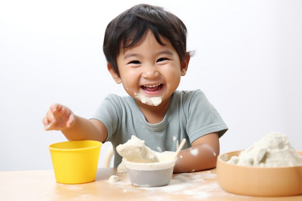 Happy asian kid dessert food bowl. AI generated Image by rawpixel.