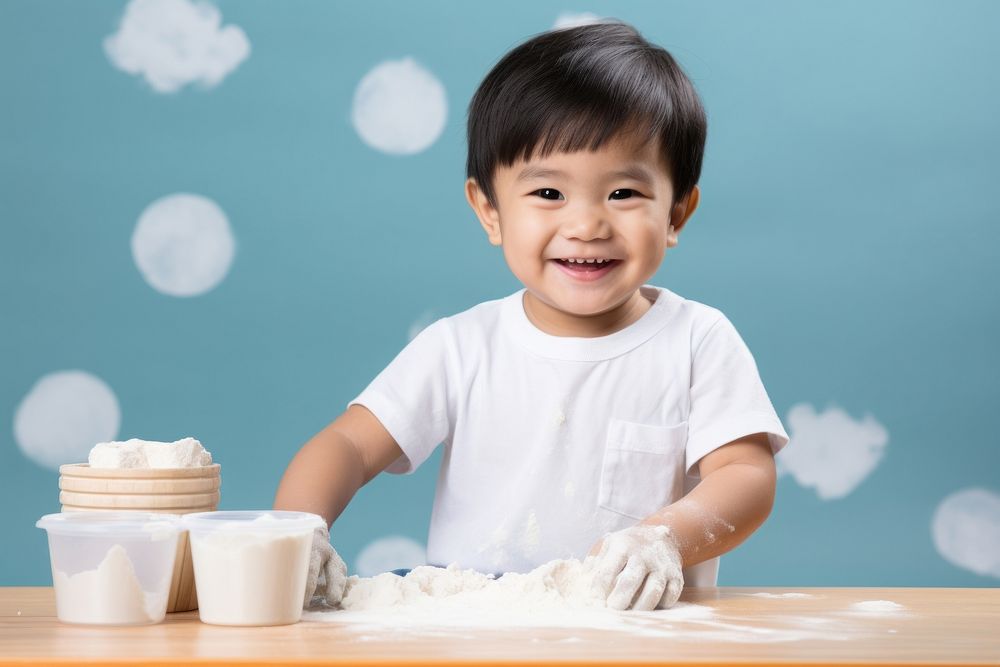 Happy asian kid child milk innocence. AI generated Image by rawpixel.