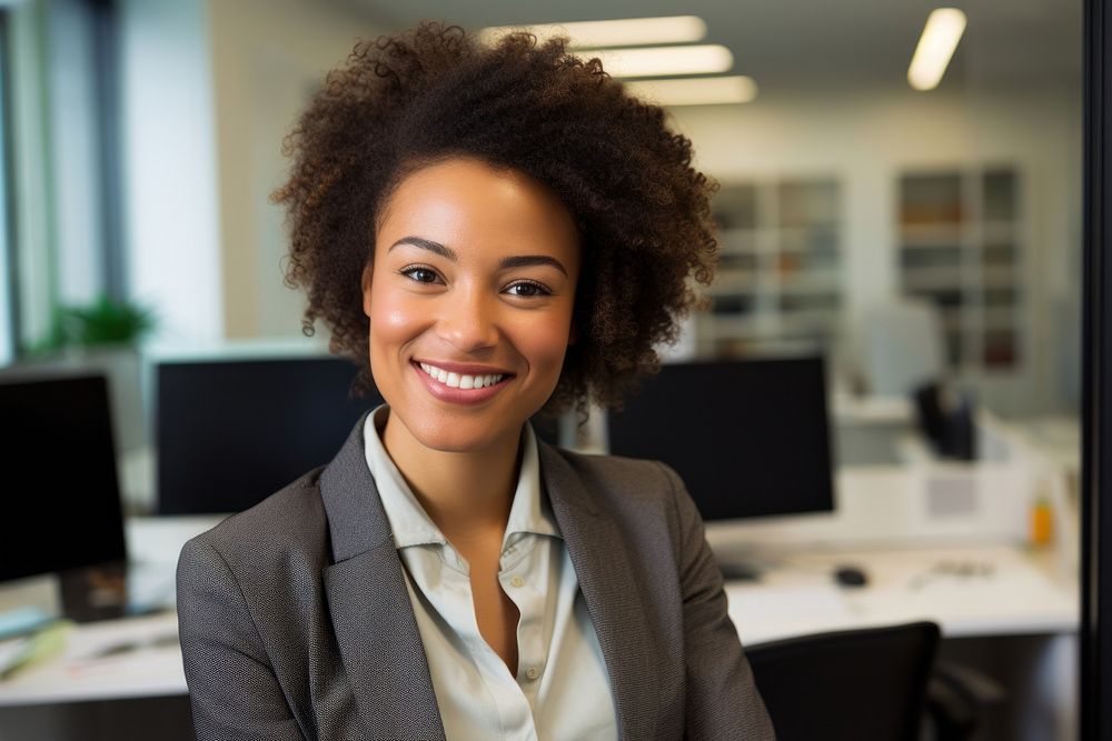 African American woman smile working office. AI generated Image by rawpixel.