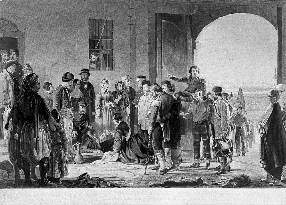 Florence Nightingale receiving wounded soldiers at Scutari Hospital. Colour lithograph after J. Barrett.