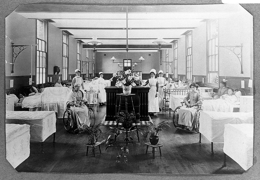 St Marylebone Infirmary, London: ward with nurses and patients. Photograph, 1910.