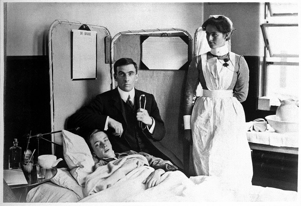 Charing Cross Hospital: Basil Hood with patient. Photograph, 1904.