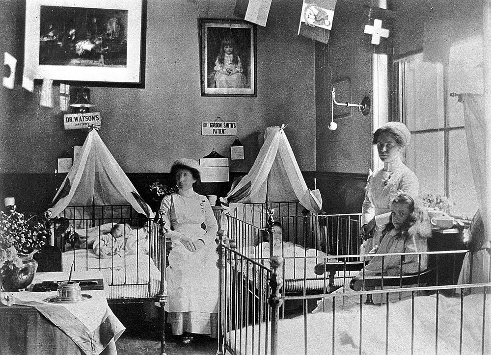 Hahnemann Hospital and Homœopathic Dispensaries, Liverpool: a children's ward, decorated with flags possibly for the…