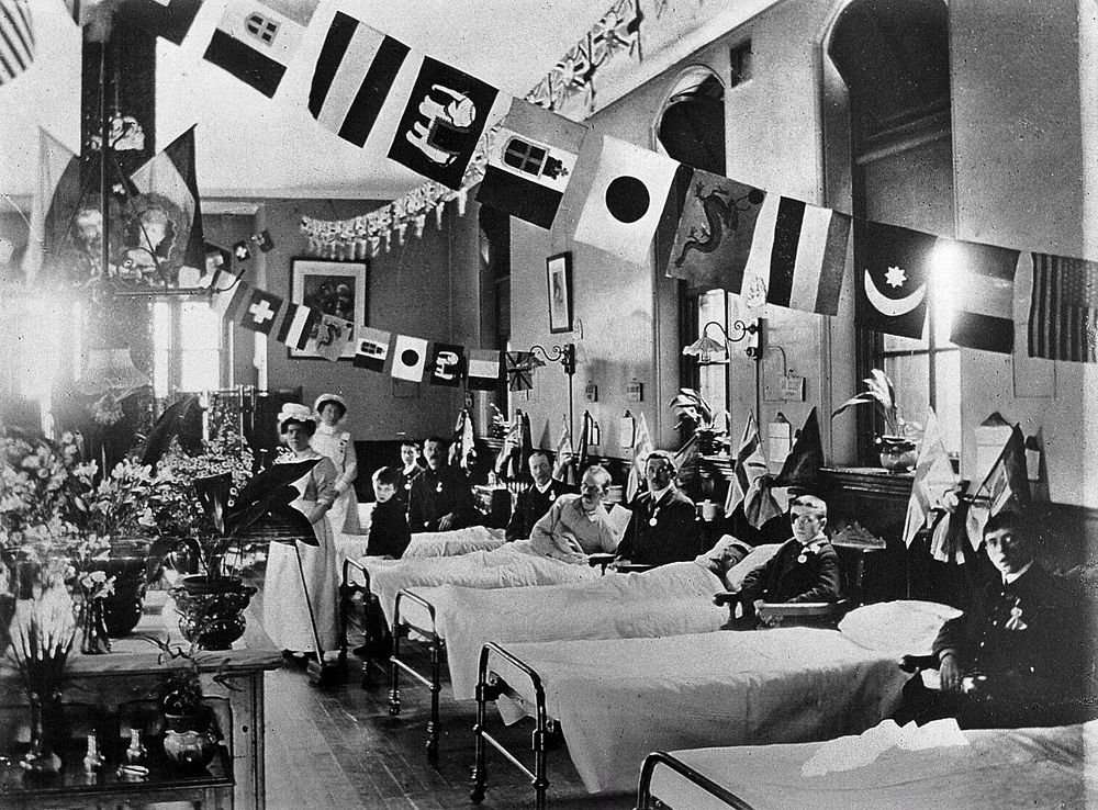 Hahnemann Hospital and Homœopathic Dispensaries, Liverpool: a ward, decorated with flags possibly for the coronation of King…