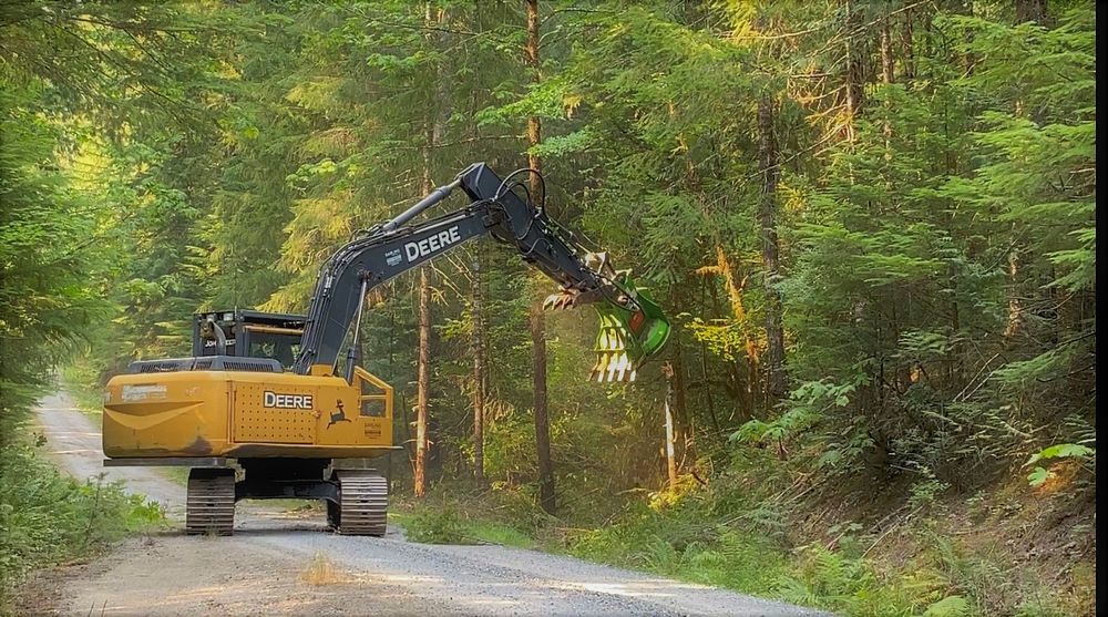 Eqpt RdsdeFuelBreaks CdrCrkFire 220810 (1)Heavy equipment helps with roadside fuel breaks during the Cedar Creek Fire on the…