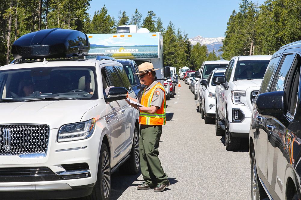Yellowstone south loop reopens, West Entrance June 22, 2022: lines into West Yellowstone, MT (3)NPS / Jim Peaco