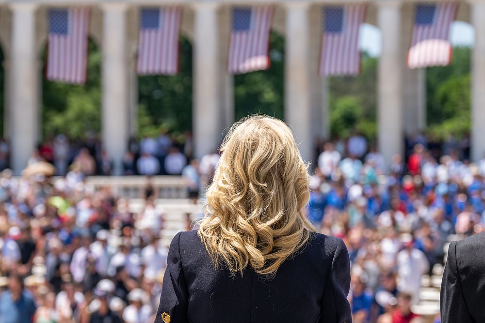 First Lady Jill Biden listens as President Joe Biden delivers remarks during a ceremony in honor of Memorial Day, Monday…