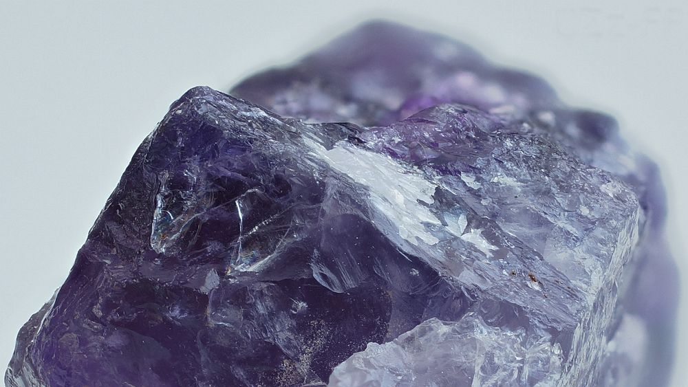 Amethyst gem stone, purple material.