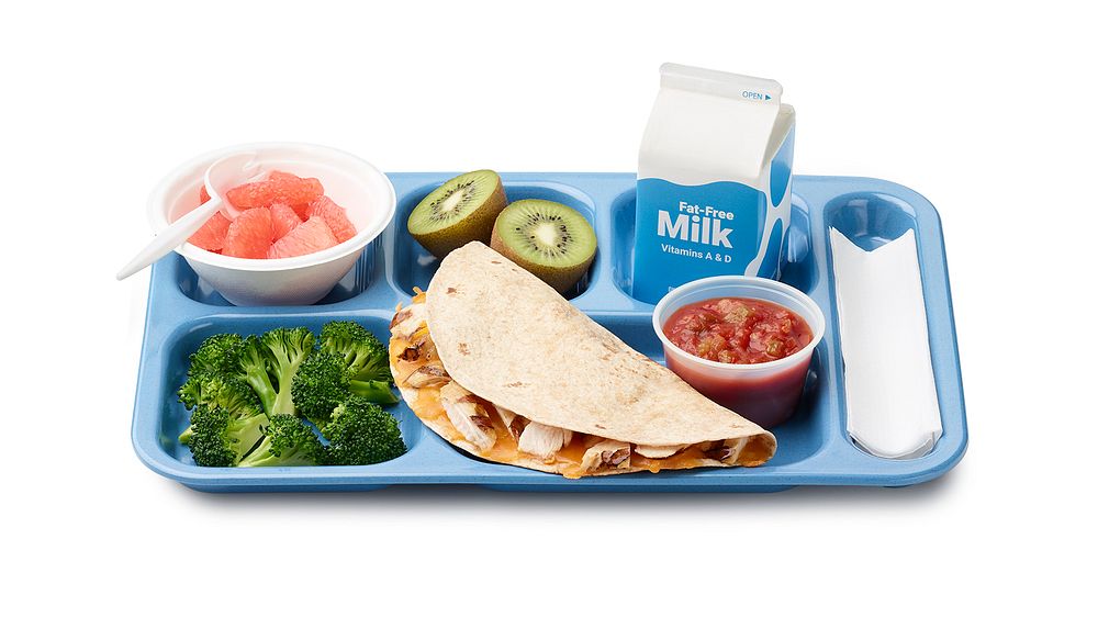 A school lunch tray showing a reimbursable meal for grades 9 through 12 served by Washougal Schools in Washington. Also…