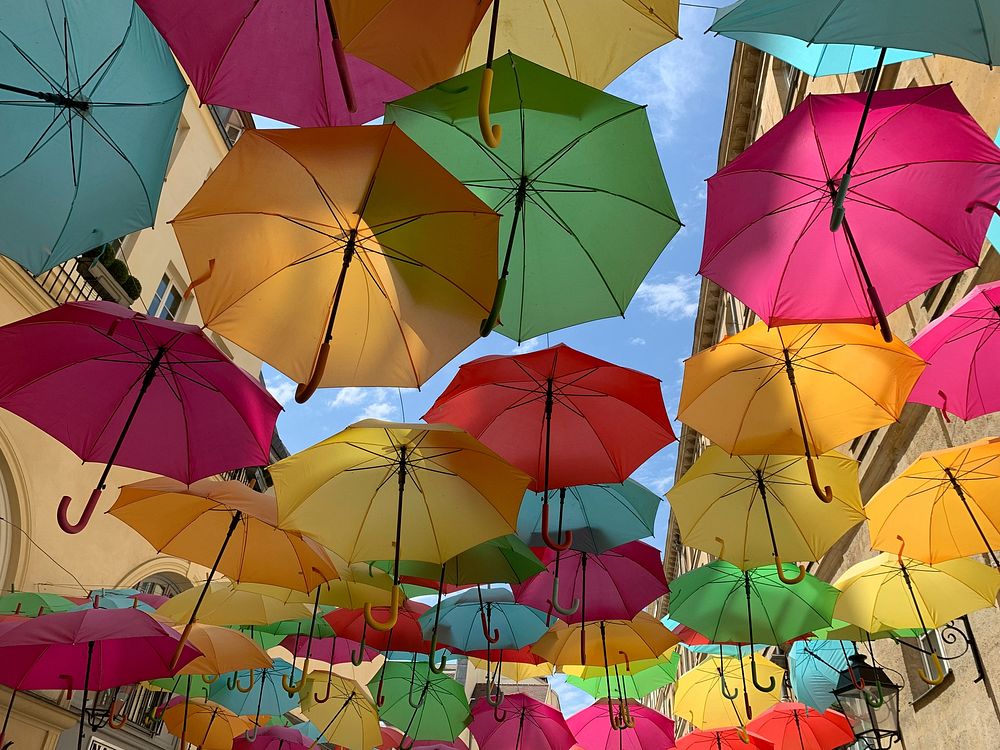 Free colorful umbrellas floating photo, public domain travel CC0 image.