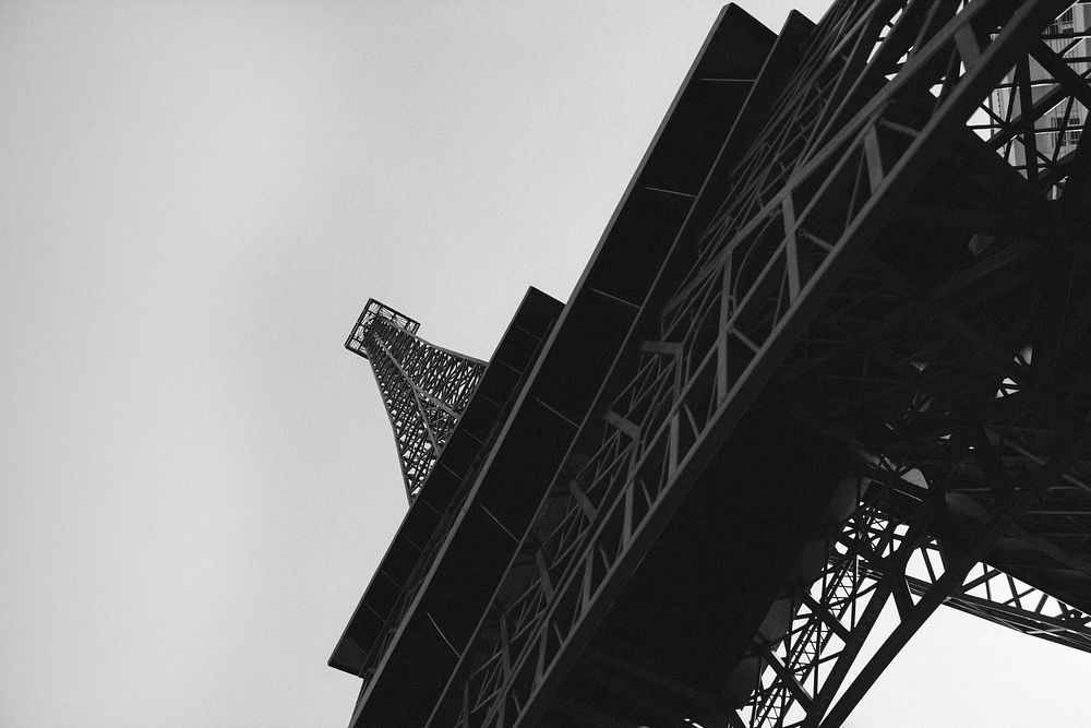 Free closeup on Paris Eiffel Tower in black and white photo, public domain building CC0 image.