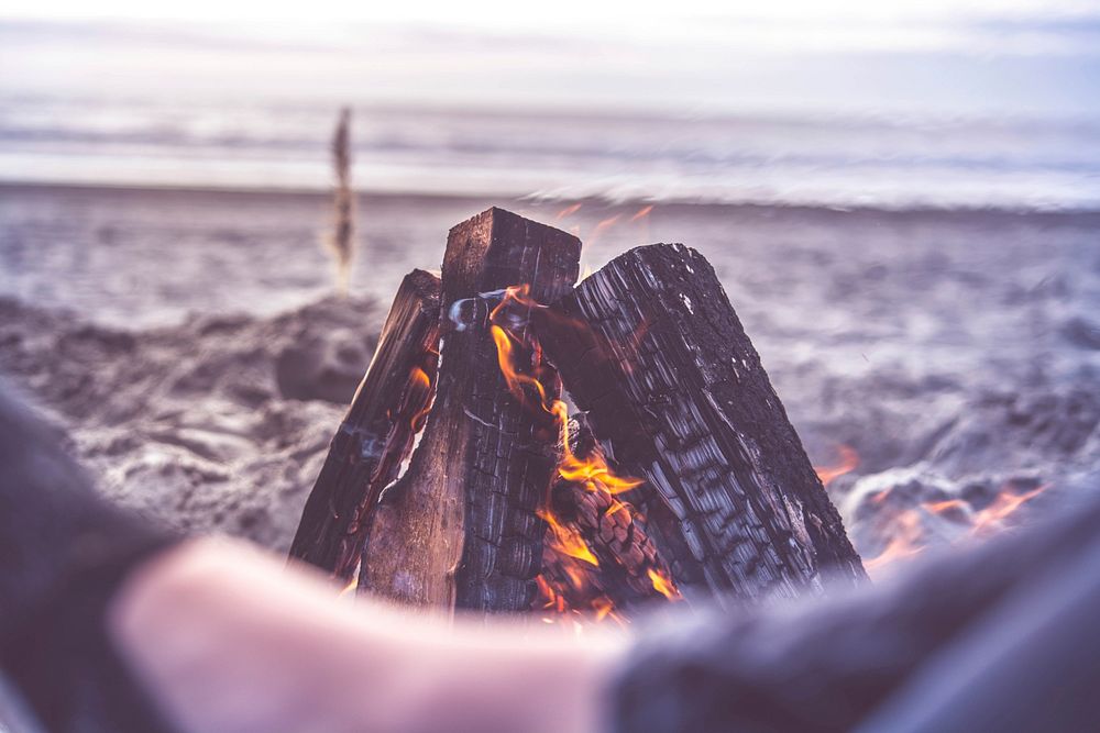 Free bonfire on the beach close up public domain CC0 photo.