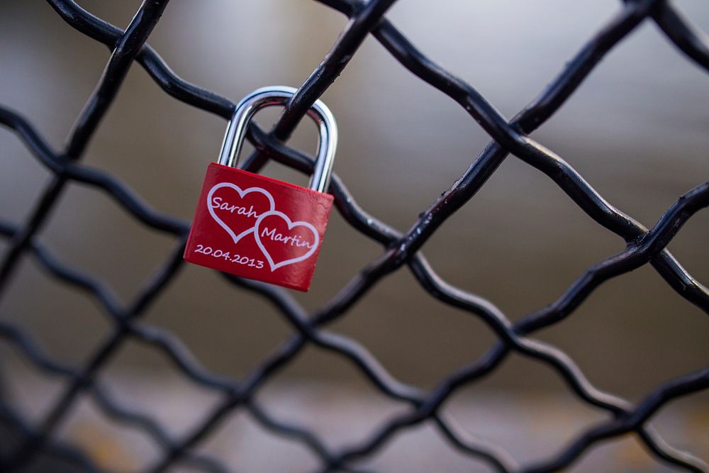 Free love lock on fence public domain CC0 photo.