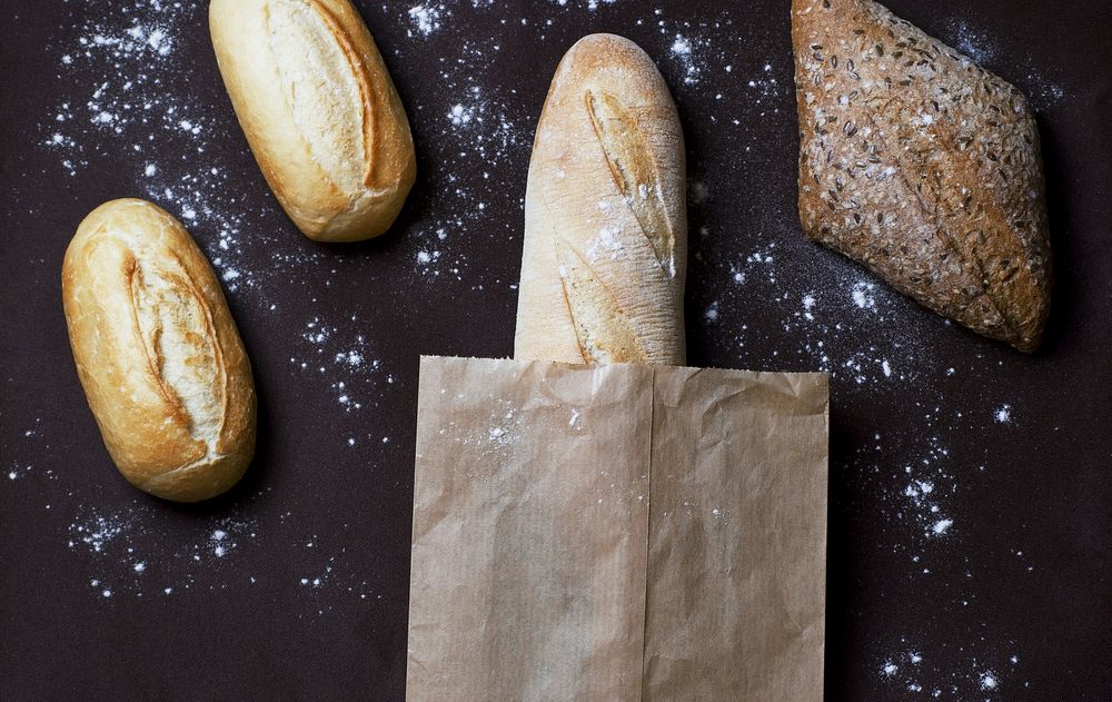 Free fresh bread baguette flat lay image, public domain food CC0 photo.