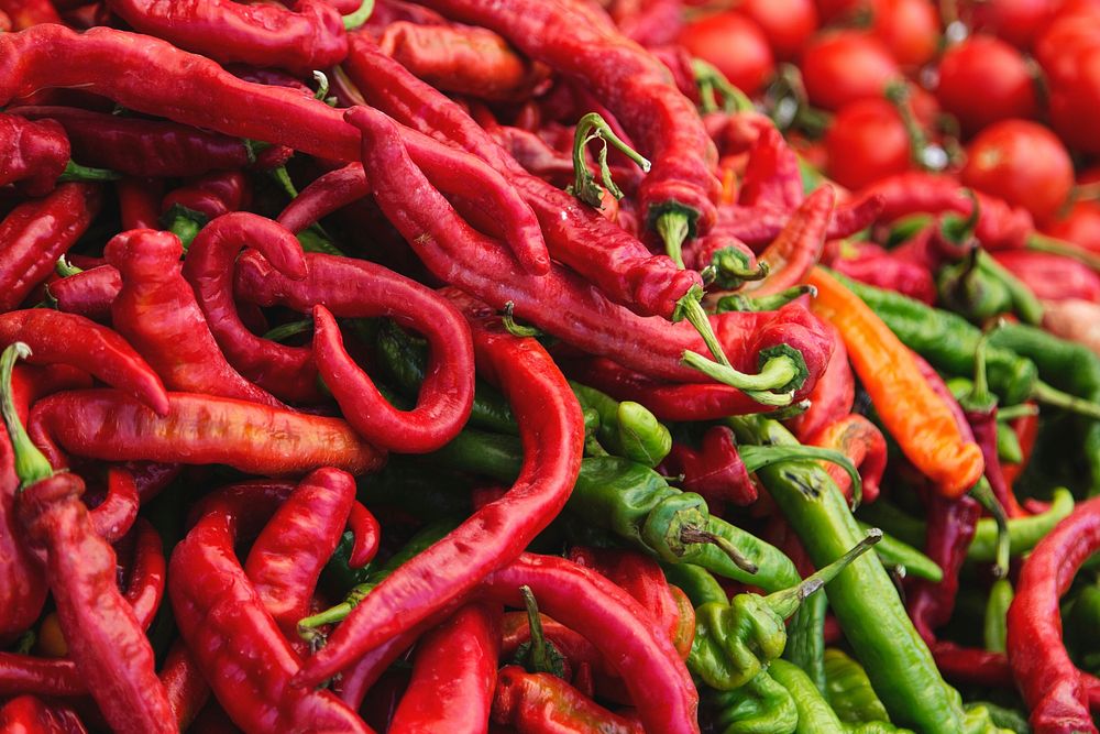Free close up of red and green hot peppers in a pile photo, public domain food CC0 image.