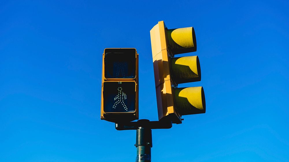 A pedestrian walk sign letting us know it is time to take that first step.