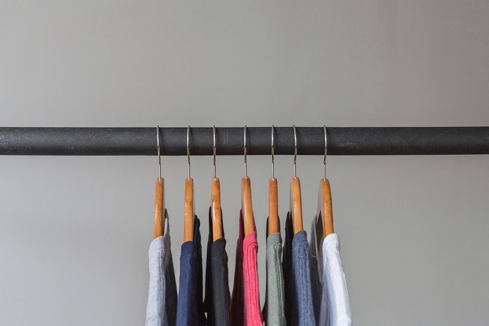 T-shirts on a hanger. Free public domain CC0 photo.