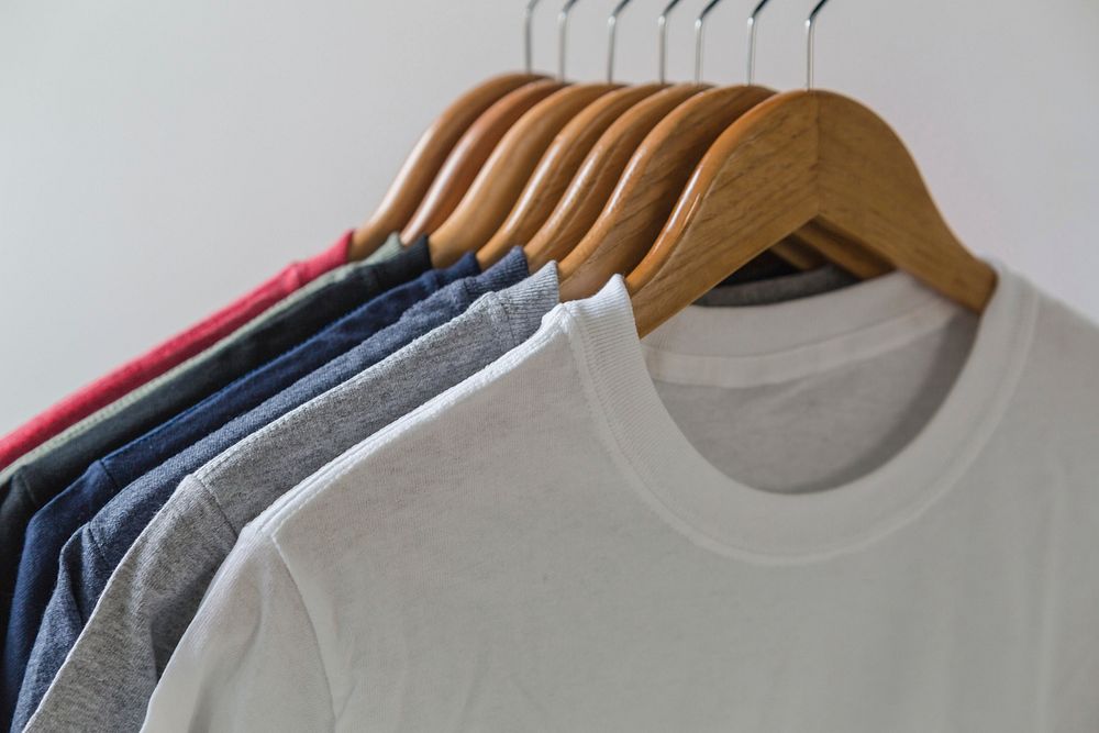 T-shirts on a hanger. Free public domain CC0 photo.