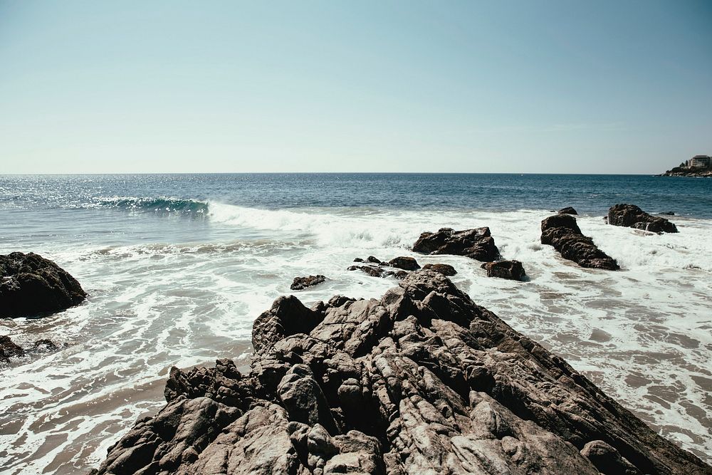 Free seascape view of rocky ocean with white foam public domain CC0 photo.